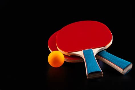 Premium Photo | Red ping pong racket. sports equipment