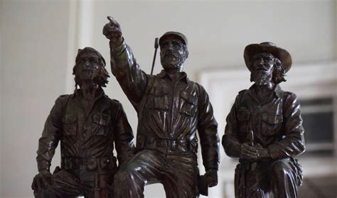 Statue of Fidel Castro, Che Guevara, and Camilo Cienfuegos at the Museum of the Revolution ...