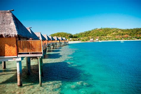 Over water bungalows and villas on the water in Fiji.