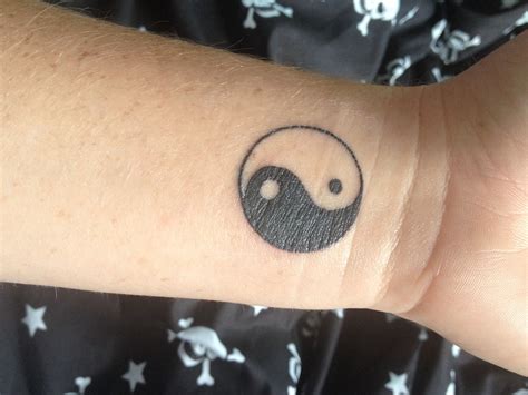 Yin yang tattoo on wrist | Cool wrist tattoos, Wrist tattoos for guys, Tattoos for guys