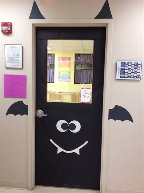 an office door decorated to look like a bat