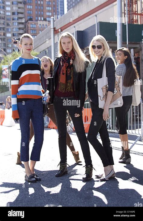 A group of models during New York fashion week street style Stock Photo - Alamy