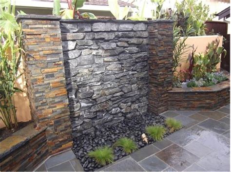 outdoor waterfall wall...I am so building one of these this summer ...