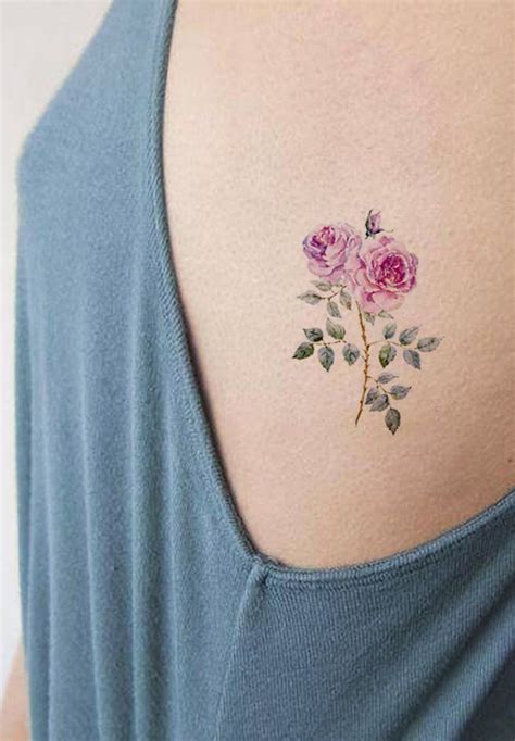 Small Cute Wild Rose Flower Rib Tattoo Ideas for Women in Watercolor - www.MyBodiArt.com #tatto ...