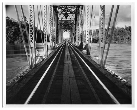 [Photograph of Railroad Bridge Crossing Flooded Sabine River] - The ...