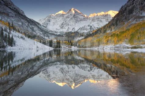 Reflections of Snow-covered Mountains and Golden Aspen Trees in a Lake ...