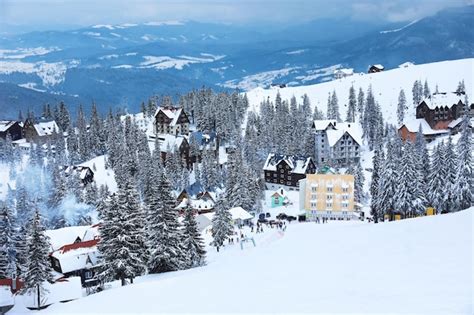 Premium Photo | Beautiful mountain ski resort on snowy day winter vacation