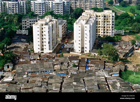 Aerial view of city slums and buildings ; rich and poor ; Bombay Mumbai ; Maharashtra ; India ...