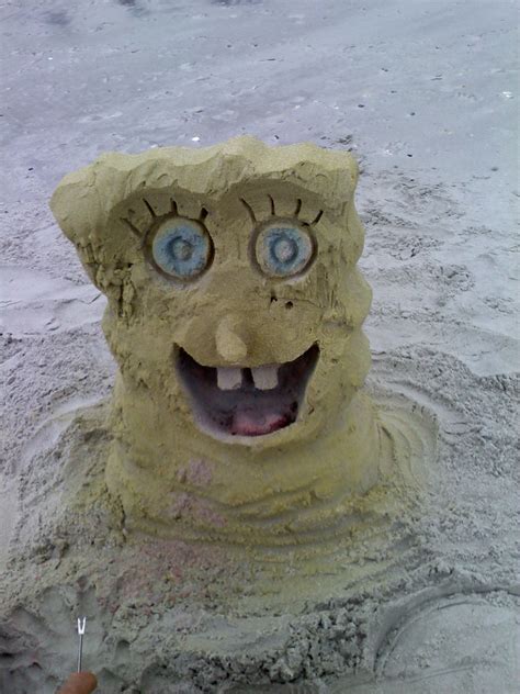 SpongeBob washed ashore | Sand sculptures, Sand art, Lion sculpture