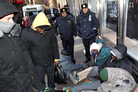 Cops clear dozens of homeless people off streets as cold sets in