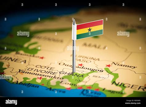 Ghana marked with a flag on the map Stock Photo - Alamy