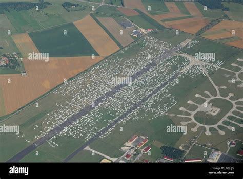 Aerial view of airport of Chaumont occupied by 25 000 gypsies (20/8/010 ...