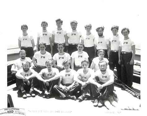 Declassified photo of a group of smiling German crewmen of the U-boat U-66 after their capture ...