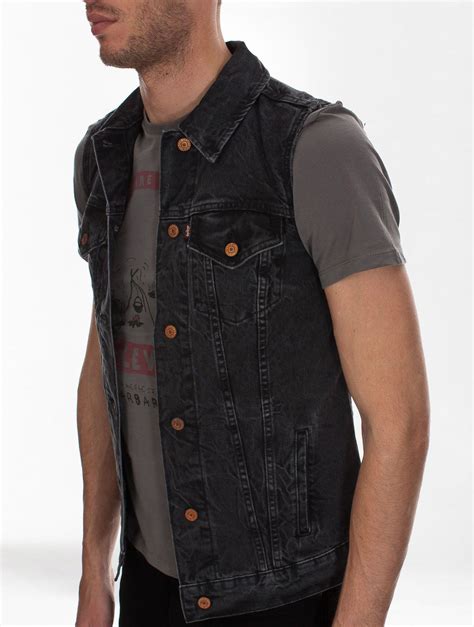 Levi's black denim vest for men. Brass detail. Sleeveless style for ...