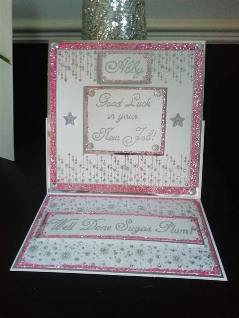 a card that has been made with glitter and is in the shape of a box