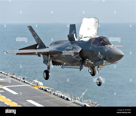 A Marine Corps F-35B Lightning II stealth fighter aircraft takes off from the amphibious assault ...