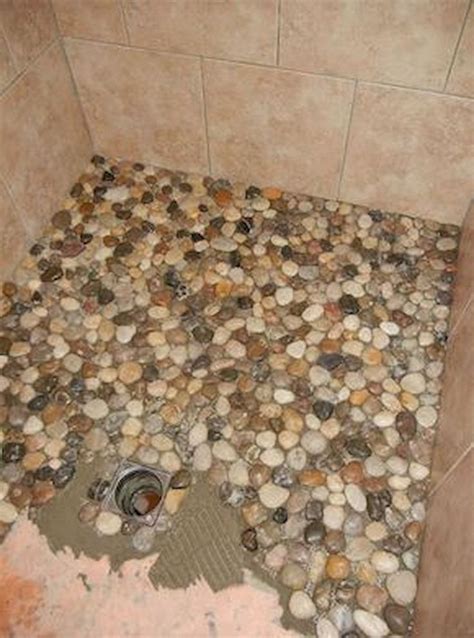 Remodel Your Residence With New Flooring (With images) | Pebble shower floor