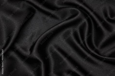 Black fabric texture background. Smooth elegant black silk can use as ...