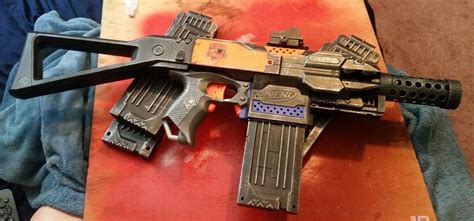 Stryfe paint/scuff job, addon parts and functional red-dot on Magpul ...