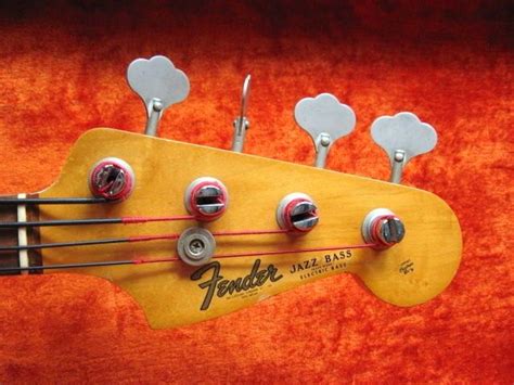 1965 Fender Jazz bass headstock - a classic work of art in itself! Darkened maple wood, original ...