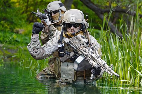 Green Berets soldiers in action Stock Photo by ©zabelin 118402558