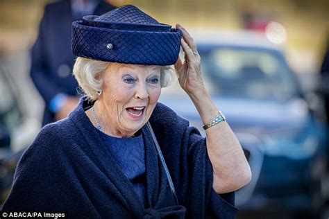 Princess Beatrix struggles to keep her hat on in Borssele | Daily Mail ...