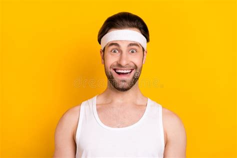 Portrait of Attractive Amazed Cheerful Guy Sportsman Good Mood Isolated Over Bright Yellow Color ...