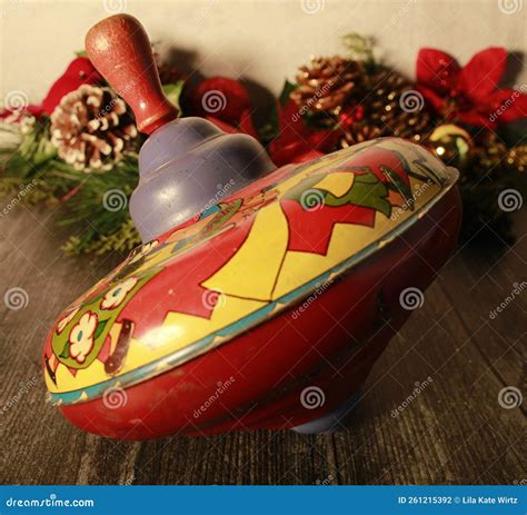 Vintage Red Metal Spinning Top Toy, Antique Stock Photo - Image of long ...