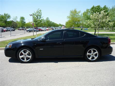 One of My favorite "everyday" cars, a black Pontiac Grand Prix. Looks very similar to my Malibu ...