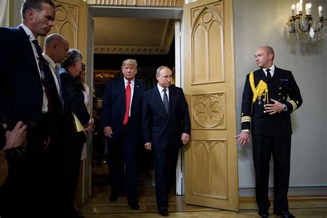 In pictures: Trump meets with Putin