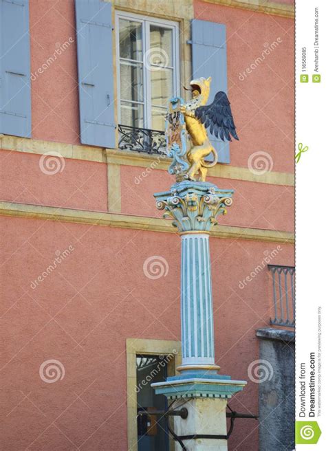 Griffon Fountain in Old Town Neuchatel, Switzerland Stock Image - Image of griffon, building ...