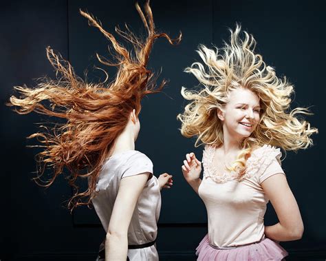 Women Dancing Hair Blowing In Wind Photograph by Betsie Van Der Meer