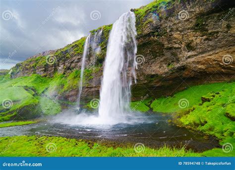 Seljalandsfoss in Iceland stock photo. Image of cascade - 78594748