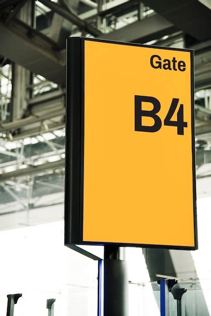 Free PSD | Yellow gate signboard mockup at the airport