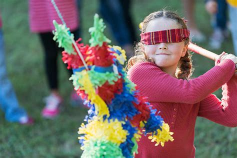 Kid Hitting Pinata Stock Photos, Pictures & Royalty-Free Images - iStock