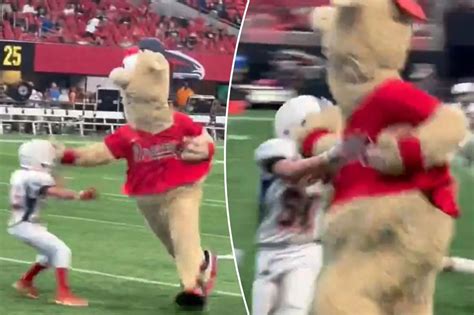 Braves mascot Blooper shamelessly stiff-arms peewee football players