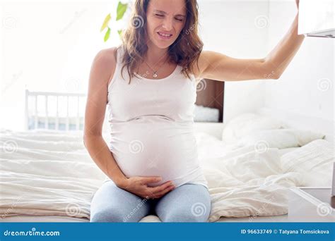 Young Beautiful Pregnant Woman, in Pain with Labor Contraction Stock ...