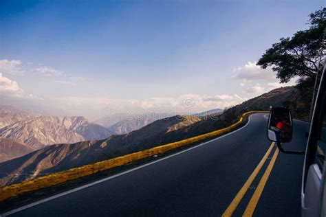 Curved Road in Mountains with Cliff Stock Photo - Image of freedom, mountain: 236921612