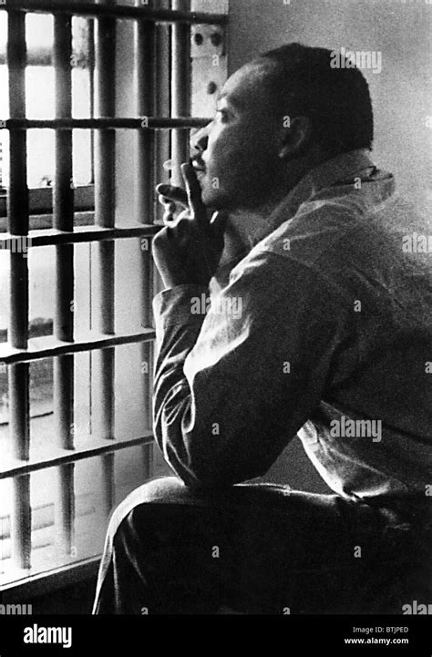 MARTIN LUTHER KING, JR, sitting in the Jefferson County Jail, in Stock ...