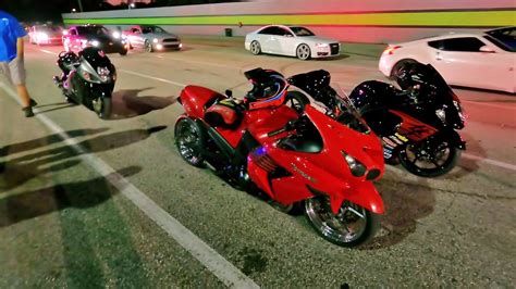 Watch A Kawasaki ZX14 Drag Bike Try to Humble the Tesla Model S Plaid