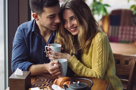 Free Photo | Couple in love drinking coffee in coffee shop