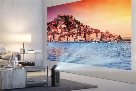 LG’s first 4K projector can beam a 150-inch picture onto your wall ...