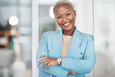 Black woman, portrait smile and arms crossed in small business management leaning on glass in ...