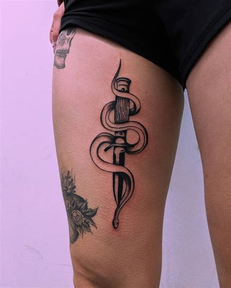 Snake and knife by Tristan Ritter - Tattoogrid.net