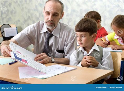 Teacher and pupil stock image. Image of schoolboy, class - 3969943