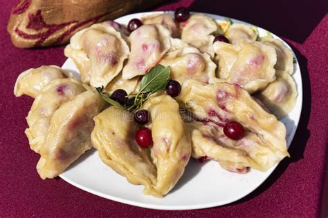 Dumplings, Filled with Cherries, Berries. Pierogi, Varenyky, Vareniki, Pyrohy - Dumplings with ...