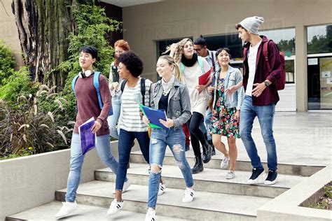 College students walking on campus - Stock Photo - Dissolve