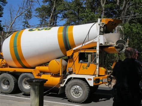 Video report: Cement truck driver trapped after snagging power lines in ...