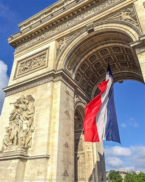 The French flag flying at the Arc de Triomphe Paris. Paris is such a beautiful city and we had ...