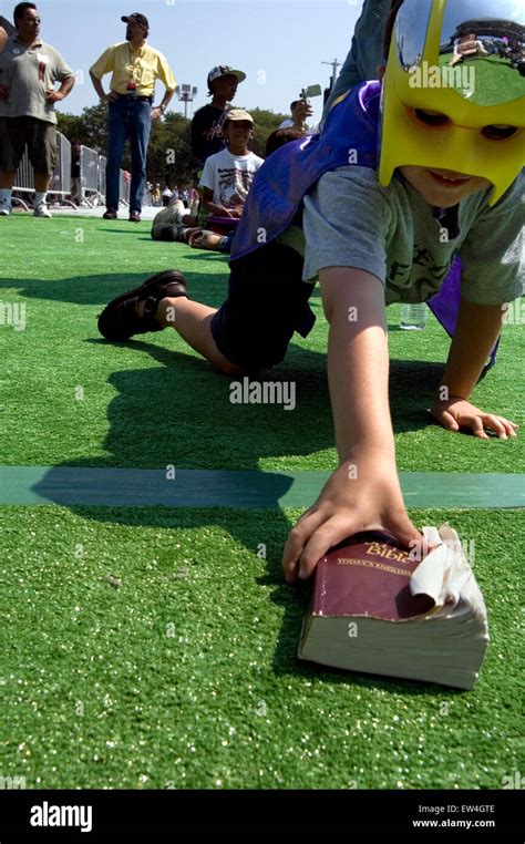 Child in a Bibleman costume at Billy Graham NYC crusade Stock Photo - Alamy